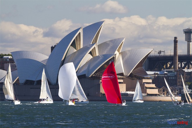 Orbit sets her kite in front of the Opera House in race 7 of the CYCA Audi Winter Series - CYCA Audi Winter Series 2012 - Race 7 (Sunday 17th June) © Pierre Spee - copyright www.sportsailingphotography.com